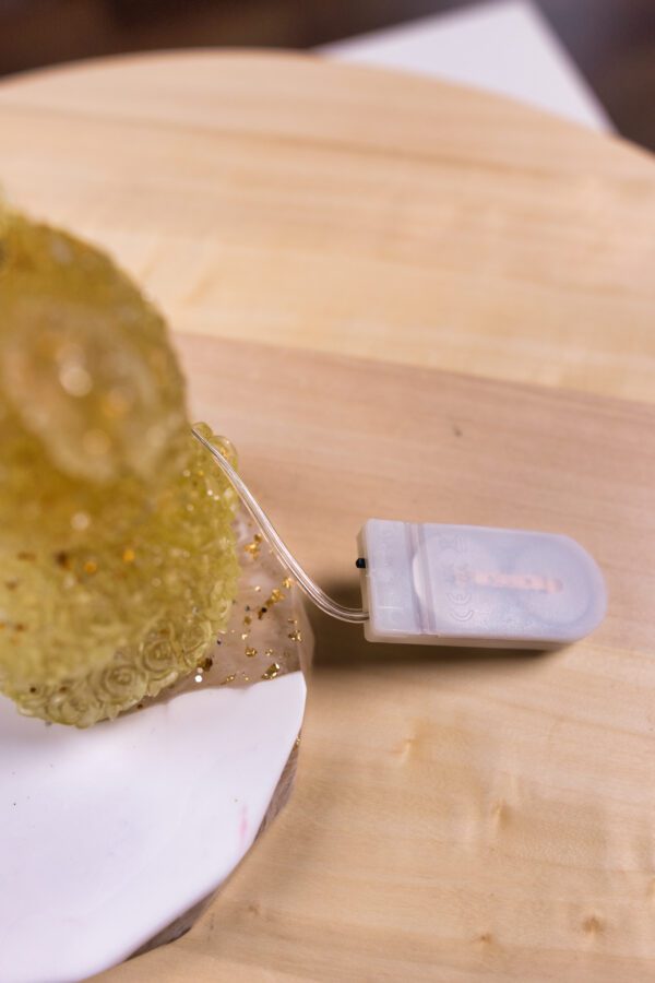 Svietiaci stojan na telefón