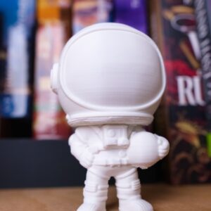 kozmonaut model postavicka 3D print tlac dekoracia kniha knihy kniznica